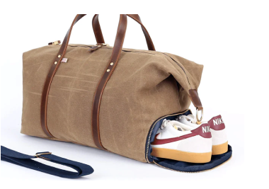 Dedicated shoe compartment with sneakers in Hudson Sutler duffel bag